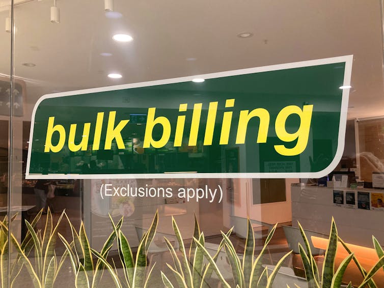 Bulk billing sign on window of GP clinic